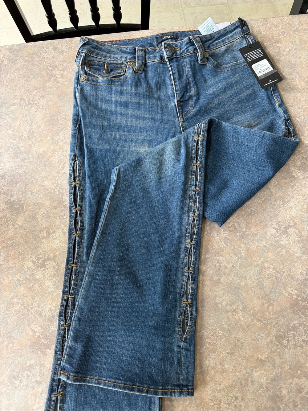 True Religion  women’s Blue Bootcut Jeans with Side Cut-out Detailing